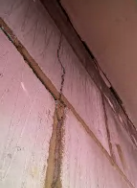cracks in house wall corby northamptonshire